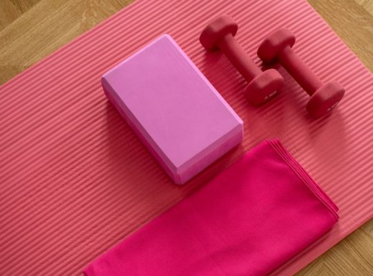 pink exercise mat with weights