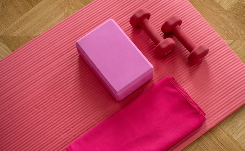 pink exercise mat with weights